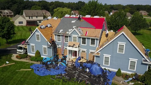 Overview of a roof being completed.