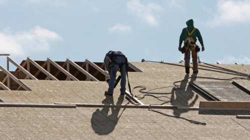 Men working on a roof.